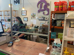 Portable Sneeze Guard inside a Pet Shop