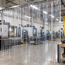 20 mil clear vinyl shop curtain dividing work areas in a machine shop