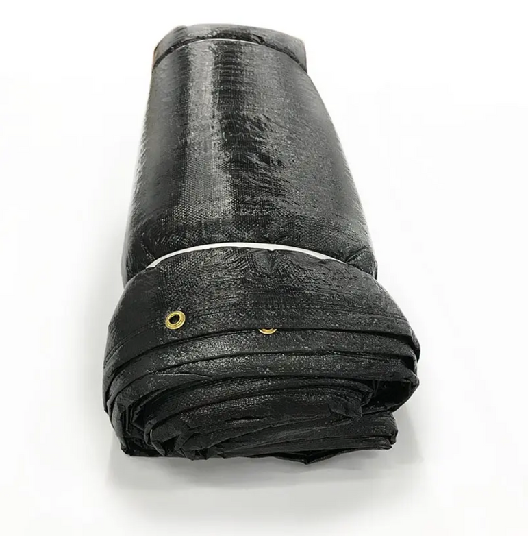 Cement blanket rolled for storage, reinforced woven poly skin in black and silver