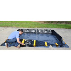 Stinger spill berm setting up for containing drums on job site
