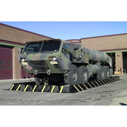 Stinger Snap Up Spill Berm for Vehicle Drive Over with HEMTT Fuel Tanker
